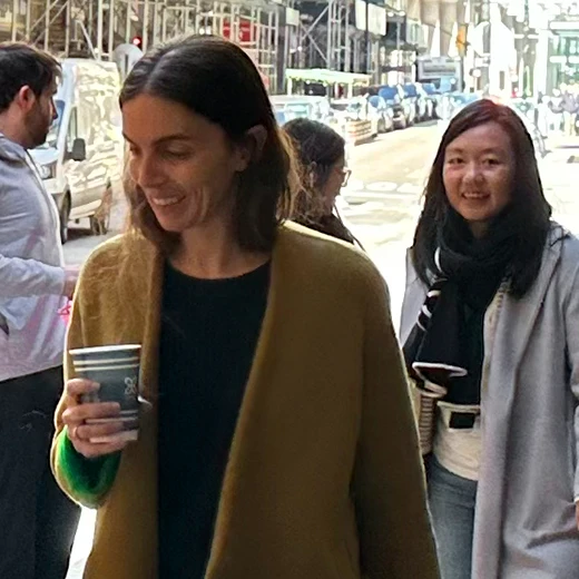 Photo of adult women talking
